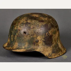 WWII German Model 1942 Camouflage Helmet with Battle Damage