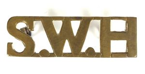 Scottish Womens Hospital S.W.H brass shoulder title staff badge