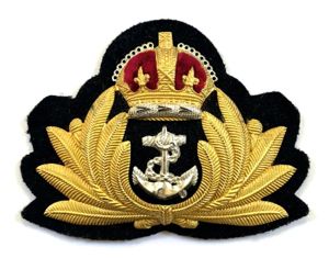 WW2 Royal Navy officers gilt metal economy issue cap badge
