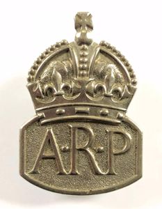 WW2 Air Raid Precautions ARP white metal male warden badge