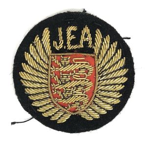 Jersey European Airways JEA cap badge