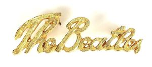 The Beatles Rock Band Gold Toned Script Brooch circa 1964