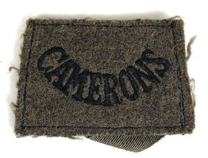 Camerons khaki woven slip on title badge c1940