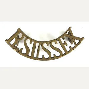 R.SUSSEX brass shoulder title badge post 1920