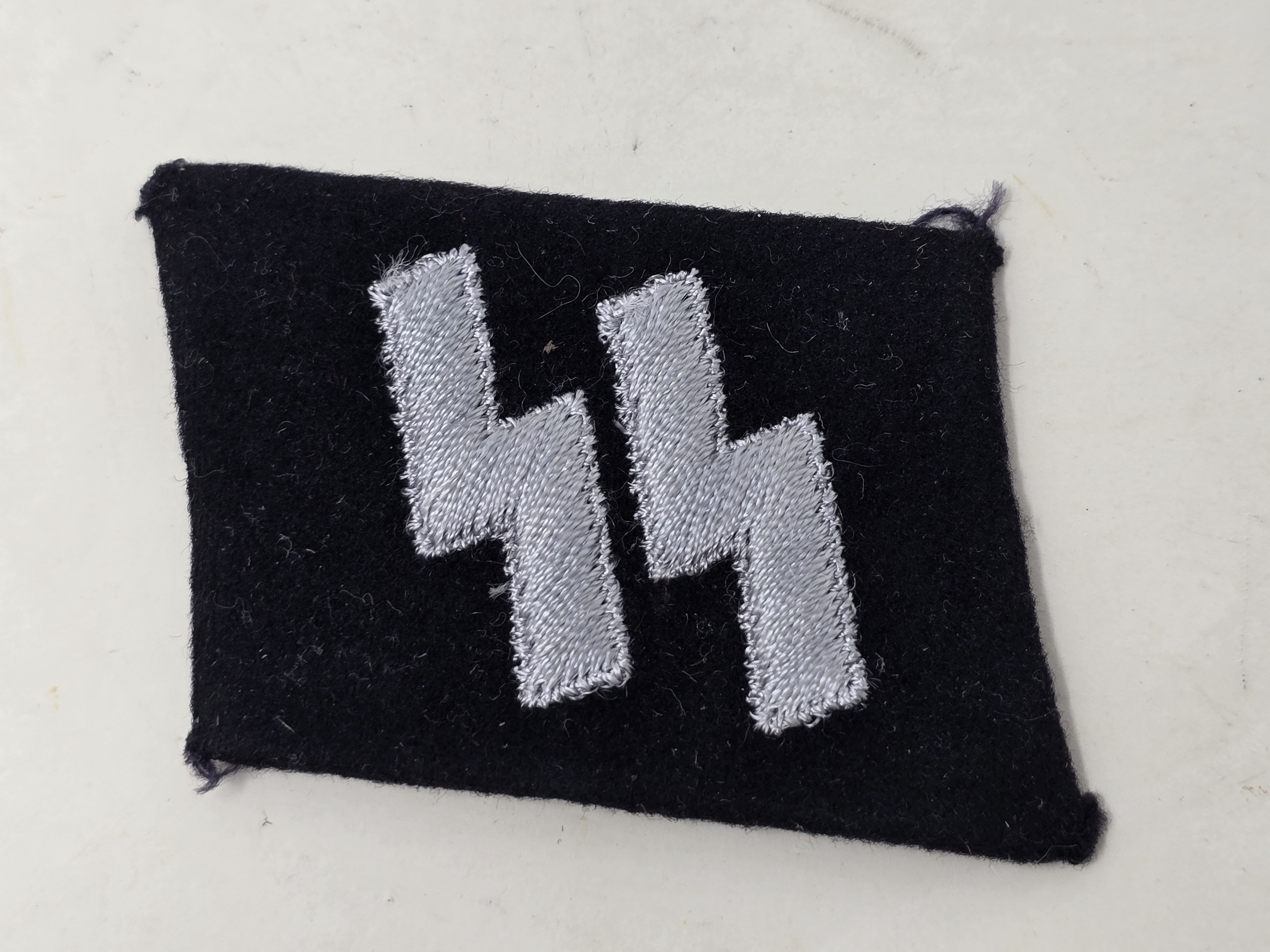 Set of Unissued Waffen-SS Collar Tabs — image 2