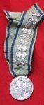 Italian WWII Mother's Medal with 9 Bows on the Ribbon
