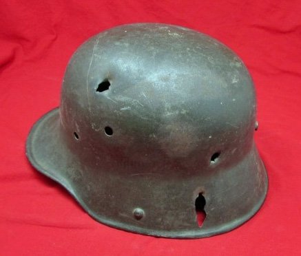  German WWII Battle Damaged M1916 Steel Helmet Shell — image 3
