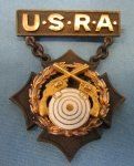 US WWI Era Gold & Bronze Pistol Marksmanship Badge, U.S.R.A.
