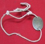 Japanese WWII Soldiers Brass Identity Tag and Neck Cord