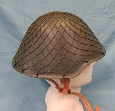  East German Cold War Era Steel Helmet & Camouflage Net — image 3