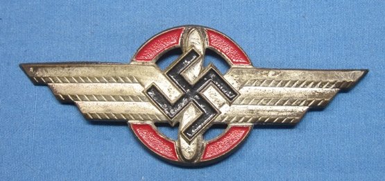 German WWII DLV Hat Emblem, Stamped & Painted — image 2