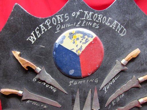 Filipino WWII-Vietnam Era Souvenir, Weapons of Moroland Philippines Wall Plaque — image 3