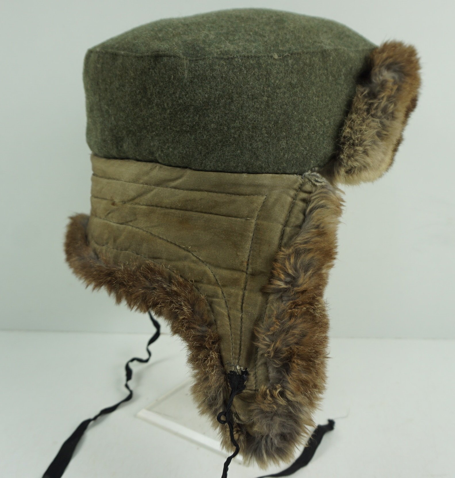Wehrmacht Winter Fur Cap (Pelzmütze). With the orginal eagle . Size 55 and date 1943 — image 10
