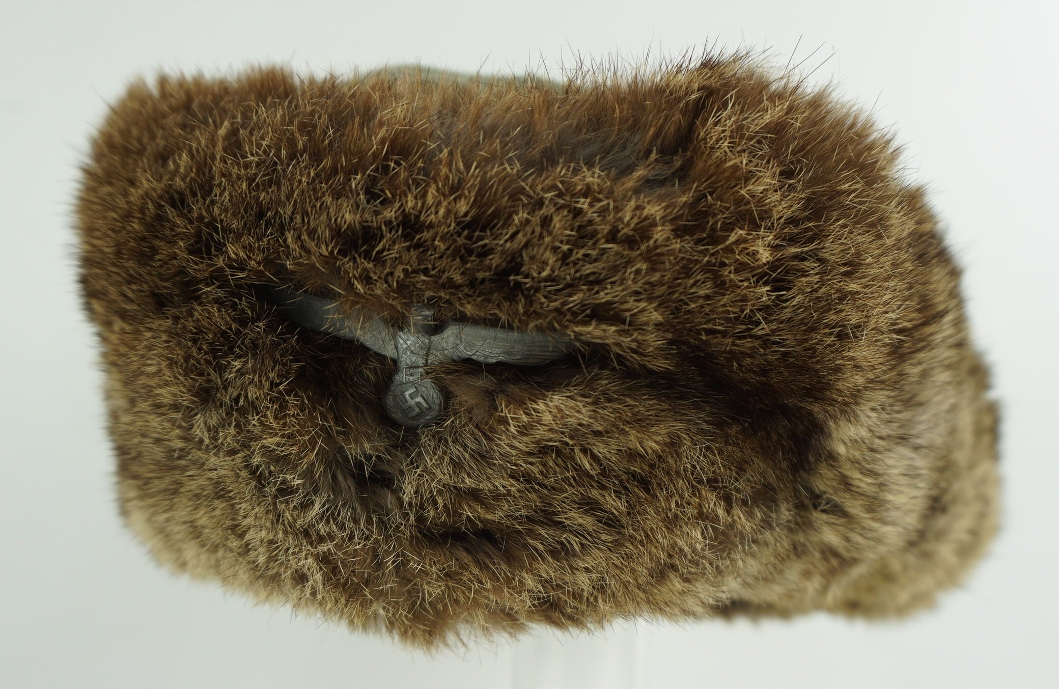 Wehrmacht Winter Fur Cap (Pelzmütze). With the orginal eagle . Size 55 and date 1943 — image 3