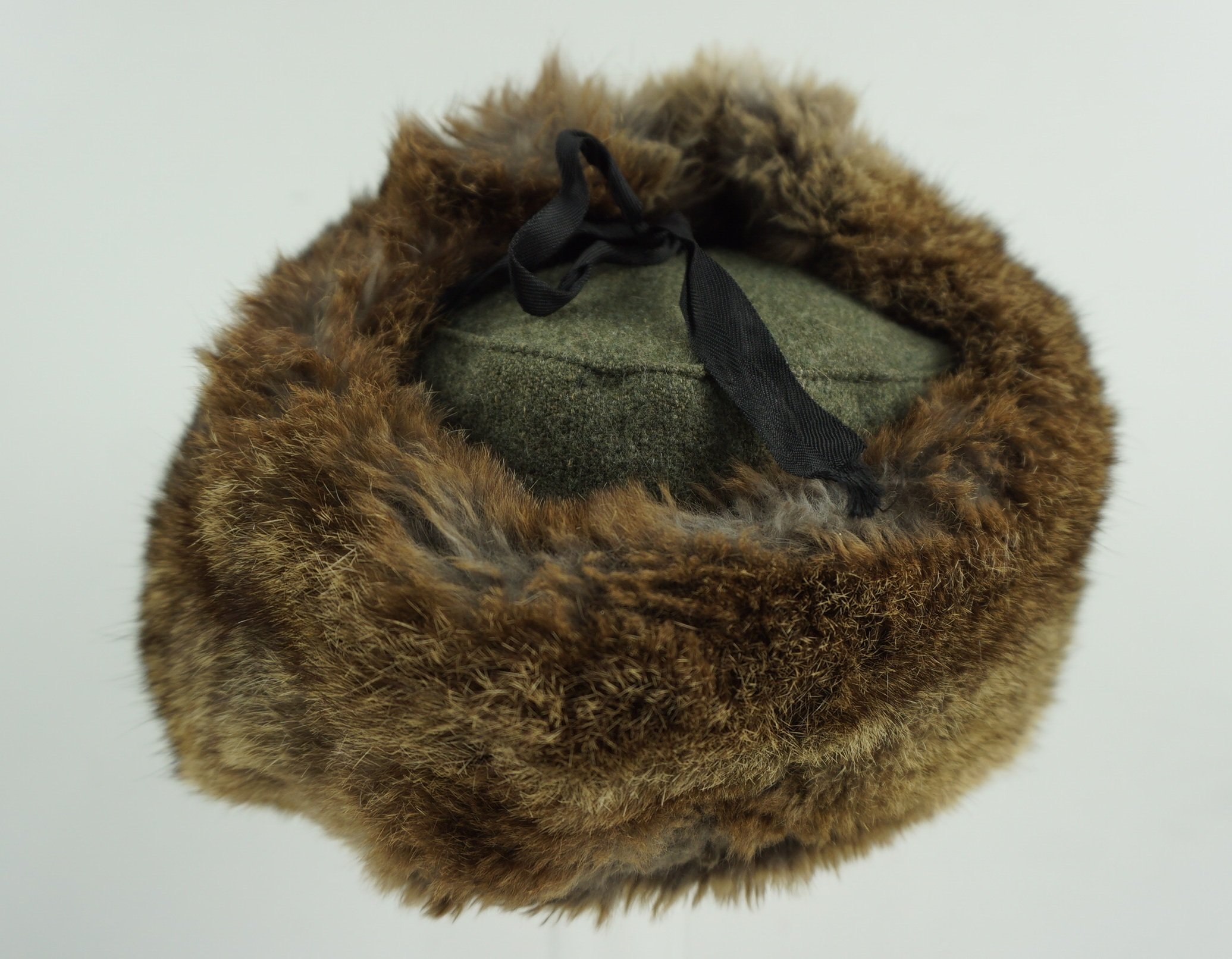 Wehrmacht Winter Fur Cap (Pelzmütze). With the orginal eagle . Size 55 and date 1943 — image 4
