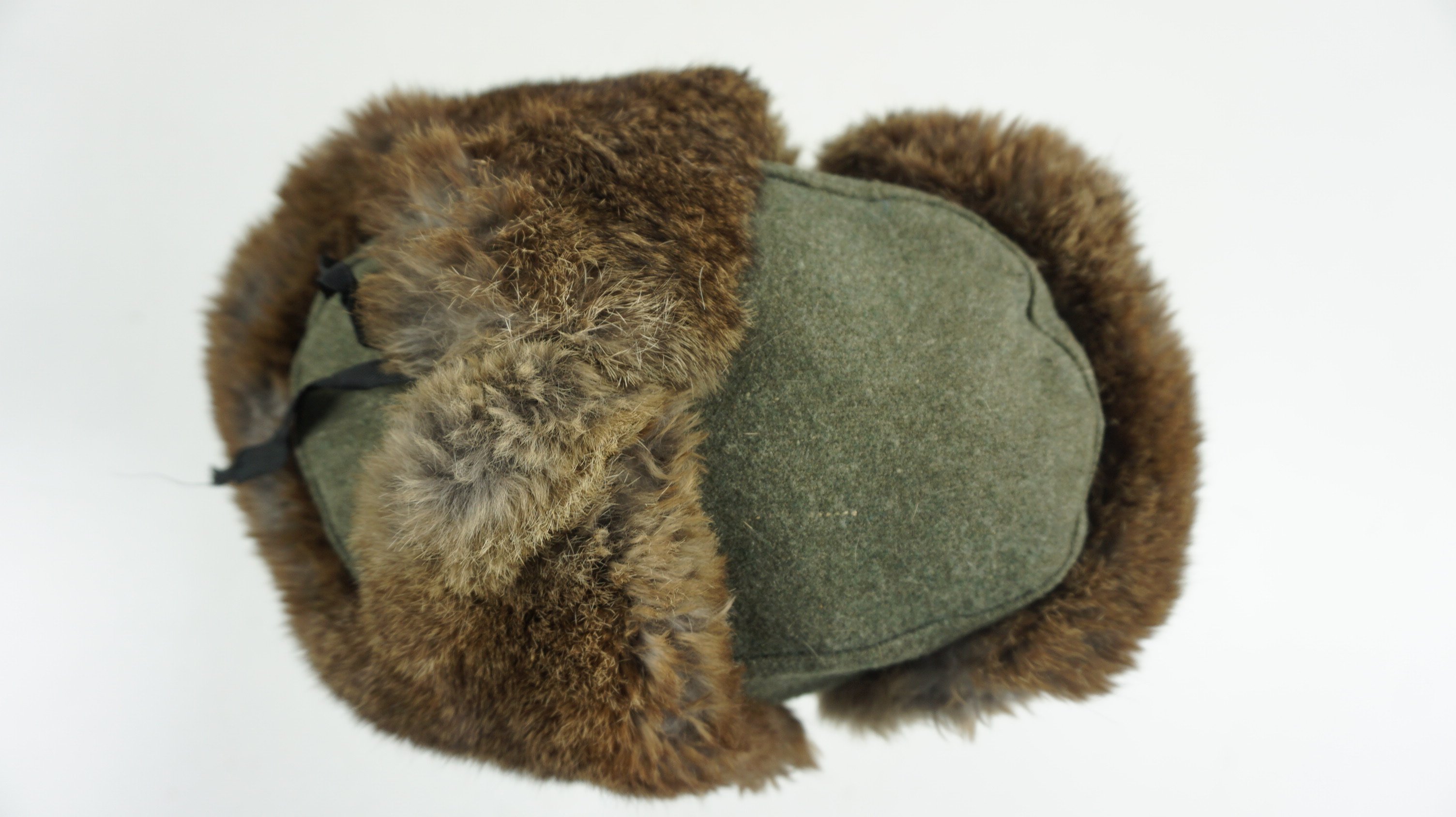 Wehrmacht Winter Fur Cap (Pelzmütze). With the orginal eagle . Size 55 and date 1943 — image 6