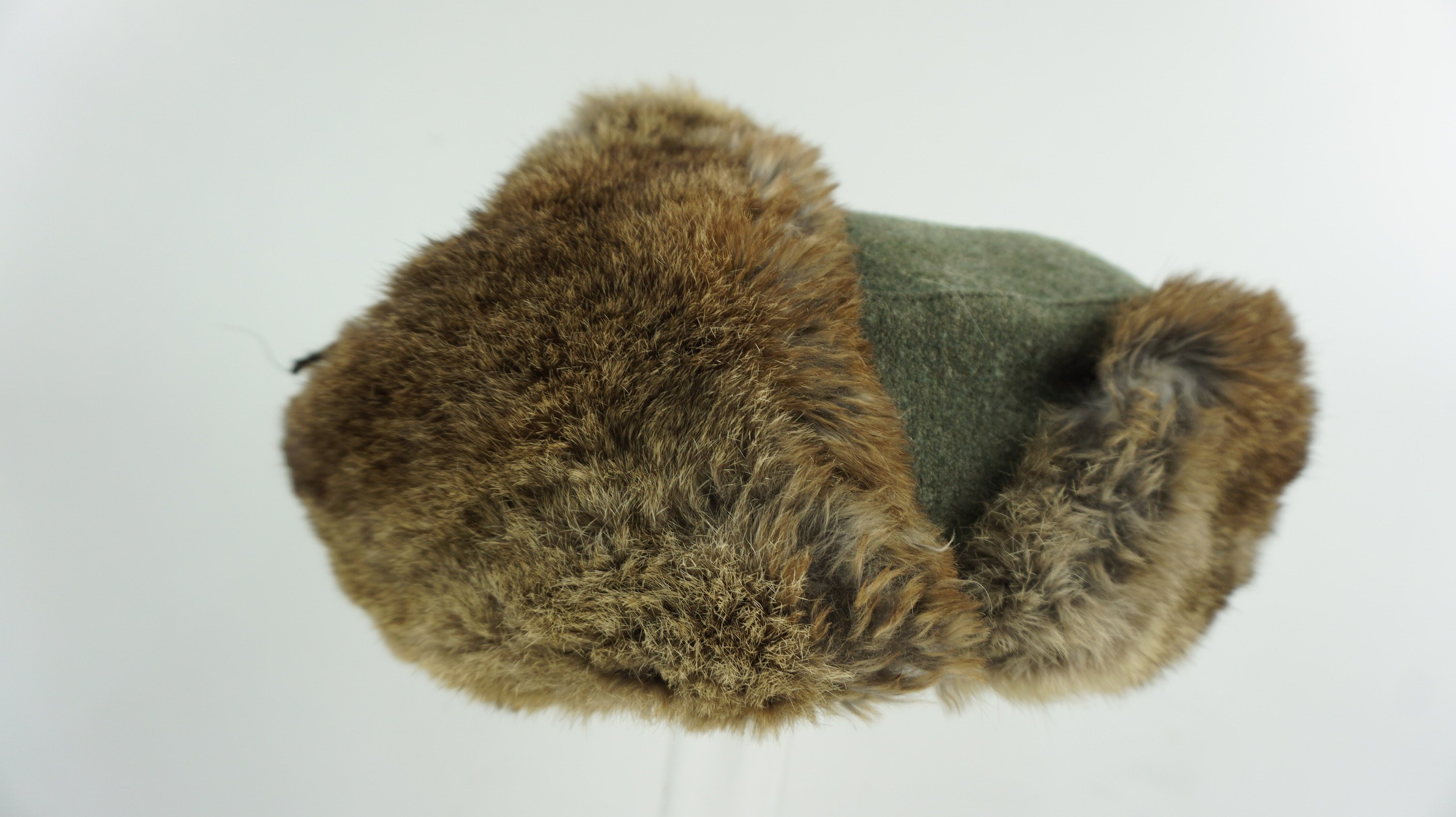 Wehrmacht Winter Fur Cap (Pelzmütze). With the orginal eagle . Size 55 and date 1943 — image 8