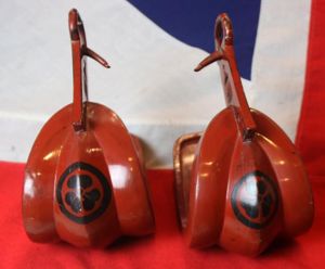 A Superb Pair of Red Lacquer Over Steel Abumi, Samurai …