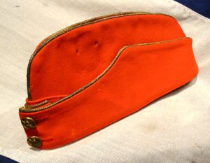 An Edwardian Colonel's Scarlet Cloth Sidecap, of 15th The Kings …