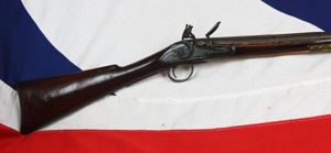 An 18th Century Flintlock Long Barrel Sporting Musket