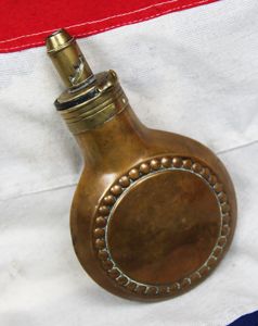 A Very Good Sykes Patent Disc Form Powder Flask