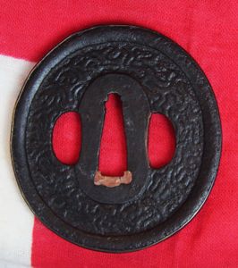 A Shinto [1596-1781] Iron Tsuba Katana Guard With Brass Mimi
