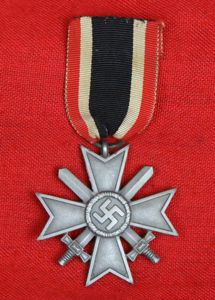 An Original WW2 German War Merit Cross With Swords..