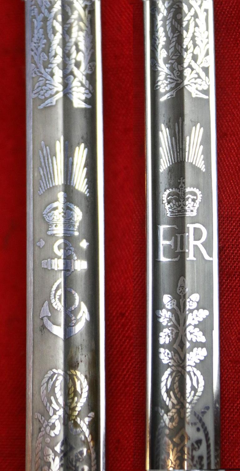 A Near Mint British Royal Naval Offcer's Sword King George VIth Hilt and Mounts With The Upgraded Wilkinson Sword 1952-53 Deluxe Elizabeth IInd Coronation Blade, Of Mirror Bright & Frosted Polish. With Original Geo VIth Sword Knot — image 3