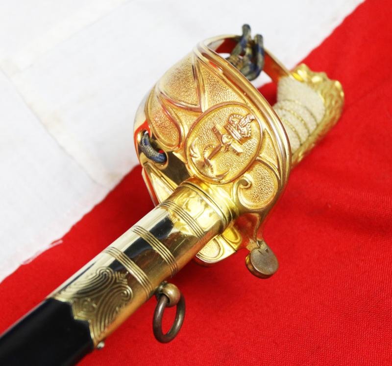 A Near Mint British Royal Naval Offcer's Sword King George VIth Hilt and Mounts With The Upgraded Wilkinson Sword 1952-53 Deluxe Elizabeth IInd Coronation Blade, Of Mirror Bright & Frosted Polish. With Original Geo VIth Sword Knot — image 5
