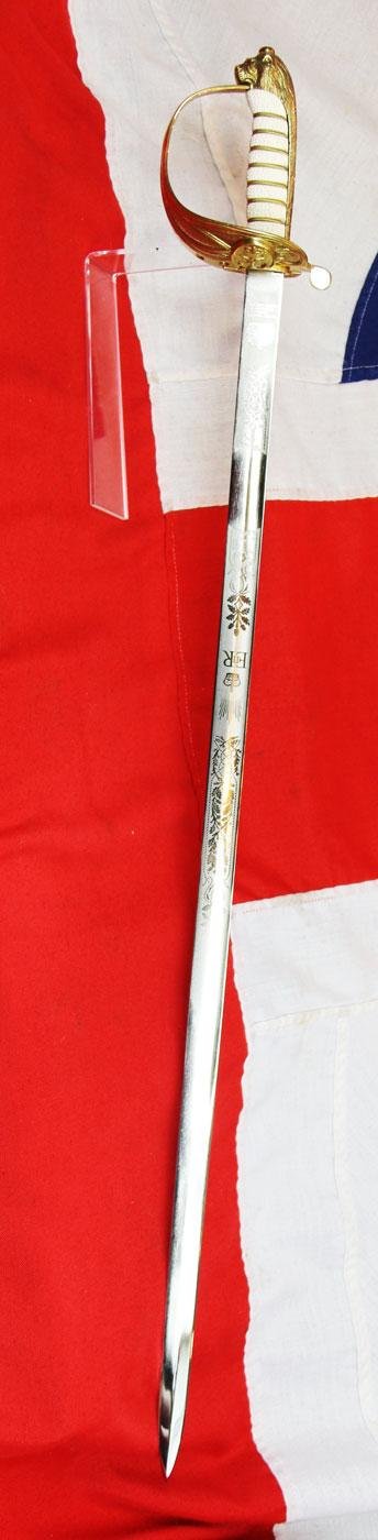 A ERII Royal Naval Officers Sword & Scabbard. Queen Elizabeth Cypher Blade & Traditional Queen's Crown Fouled Anchor Naval Pattern Hilt — image 2