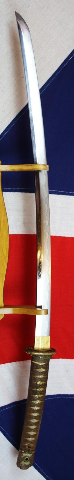 An Ancestral WW2 Japanese Officer's Sword, in Traditional Type 98 Japanese Officer's Gunto Military Mounts. Stunning Hamon Shinto Blade Circa 1680 Signed Shimosaka — image 3