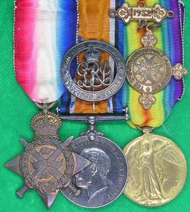 WW1 1914 MONS STAR TRIO & ORIGINAL SILVER WAR BADGE, …
