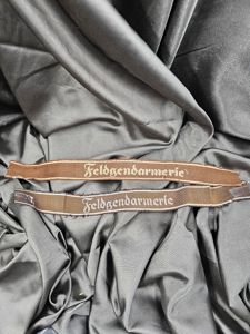 WWII GERMAN FELDGENDARMERIE BEVO AND WOVEN CUFFTITLES