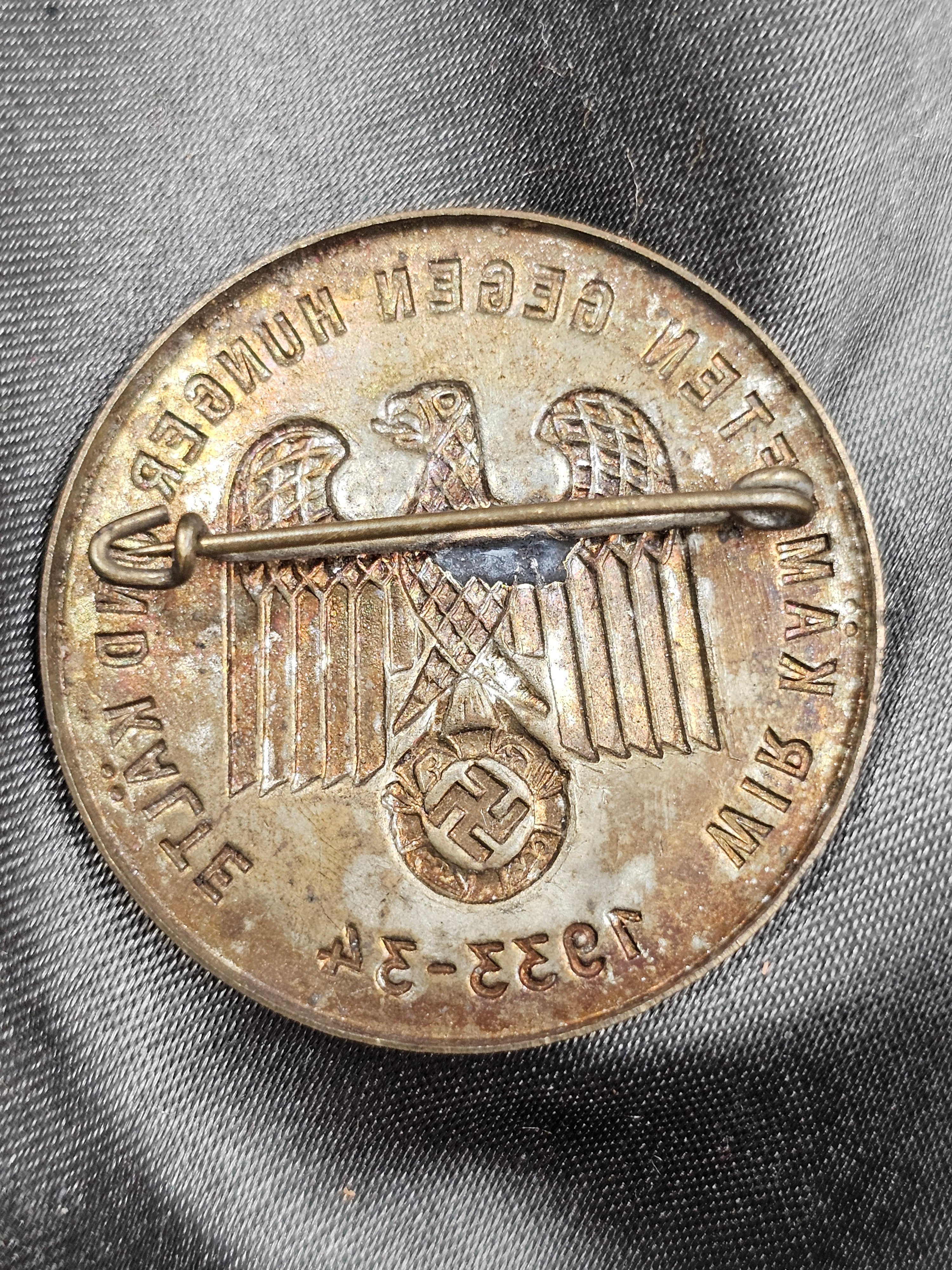 WWII GERMAN WHW FIGHTING AGAINST HUNGER AND COLD TINNIE — image 2