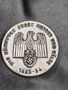 WWII GERMAN WHW FIGHTING AGAINST HUNGER AND COLD TINNIE