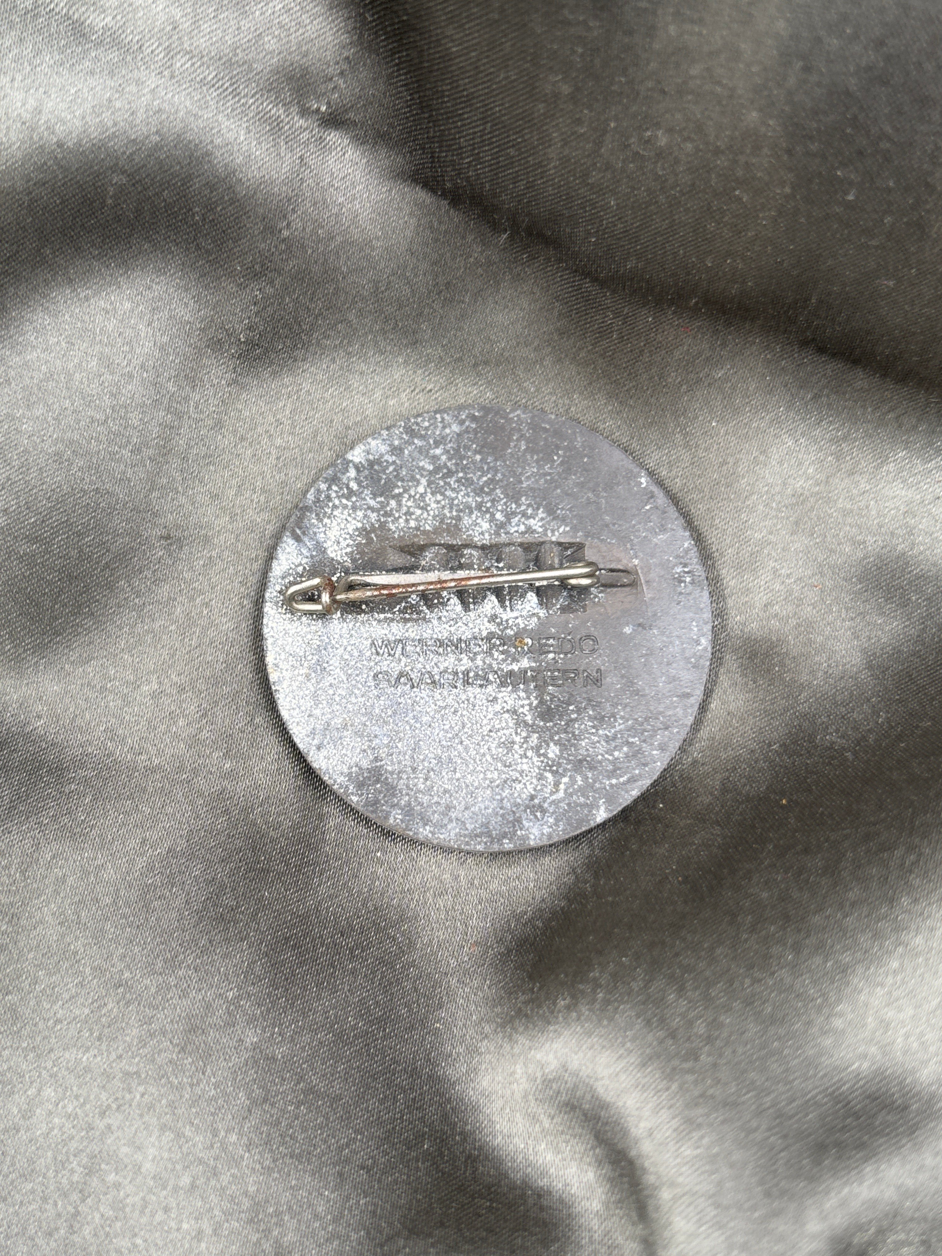 WWII GERMAN 1937 REICHSPARSTETAG TINNIE — image 2