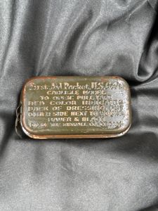 WWII FIRST AID BANDAGE CARLISLE TIN