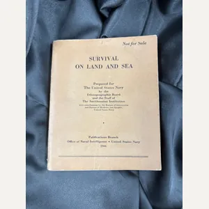 WWII SURVIVAL ON LAND AND SEA BOOK