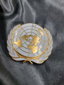 UNITED NATIONS BERET BADGE