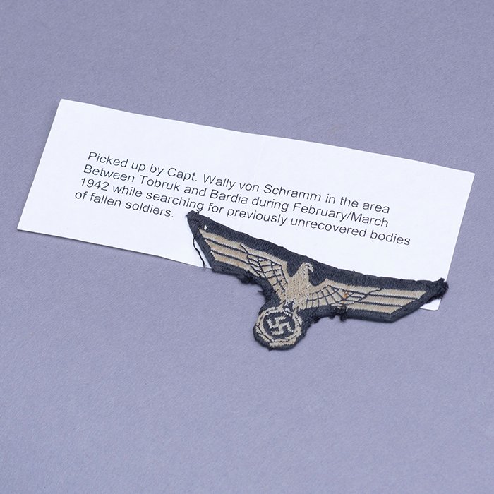 HSS262 Woven national emblem removed from a Heer black Panzer M34 overseas cap by a New Zealand Infantry officer in eastern Cyrenaica — image 2