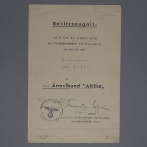 SH52 Award document to a Kreigsmarine Bootsmannsmaaten for the Afrika …