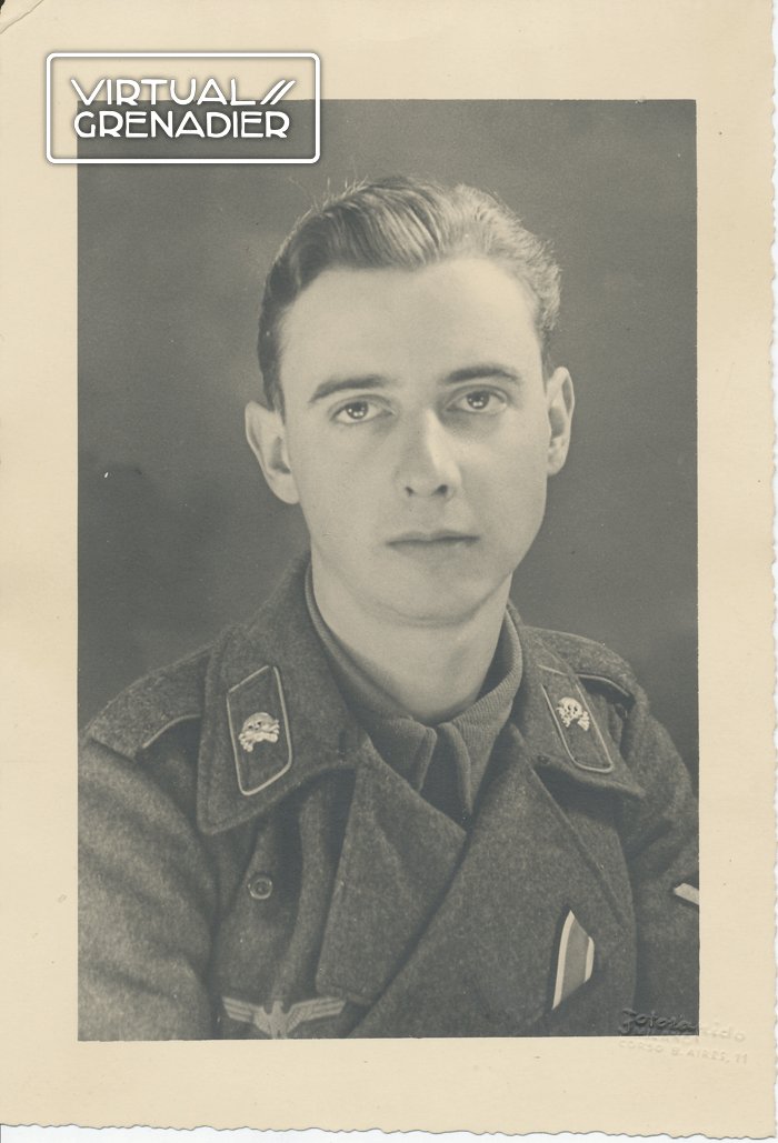 Photo of young Heer Gefreiter wearing assault gun wrap with lightly piped skull tabs — image 2