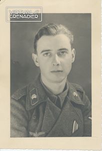 Photo of young Heer Gefreiter wearing assault gun wrap with …