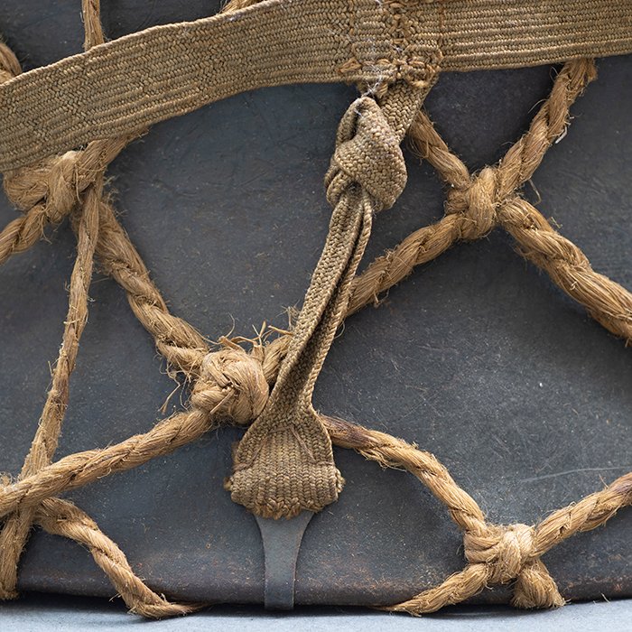 RH29 Heer M40 single decal camouflaged helmet with issue net and elastic bands — image 11