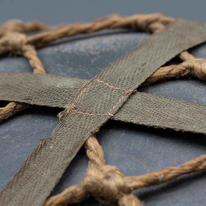 RH29 Heer M40 single decal camouflaged helmet with issue net and elastic bands — image 15