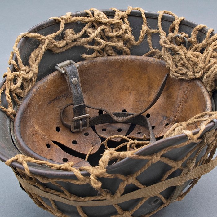 RH29 Heer M40 single decal camouflaged helmet with issue net and elastic bands — image 21