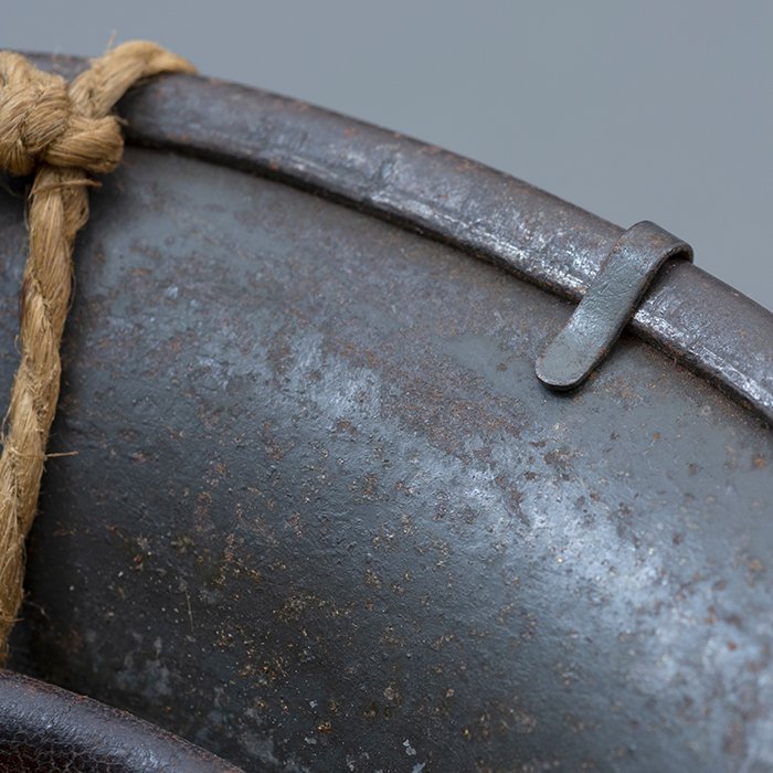 RH29 Heer M40 single decal camouflaged helmet with issue net and elastic bands — image 27