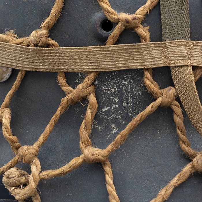 RH29 Heer M40 single decal camouflaged helmet with issue net and elastic bands — image 3