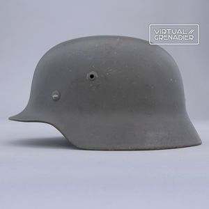 RH22 Heer M35 double decal camouflaged over paint helmet