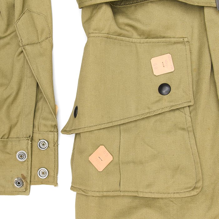 RCU10 Unissued U.S. M42 Paratrooper jump jacket with paper cutter tags — image 11